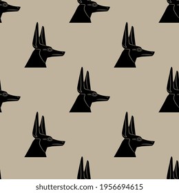 
Seamless monochrome animal pattern with heads of ancient Egyptian jackal or canine headed god Anubis. 