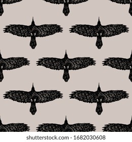 Seamless monochrome animal pattern with silhouettes of flying ravens. Hand drawn ink sketches.