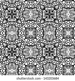 Seamless monochrome background made of dots and curls.