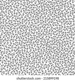 Seamless monochrome background of small flowers on white . Vector