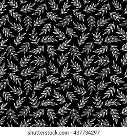 Seamless monochrome  decorative template texture with white leaves on the black background. Seamless stylized leaf pattern. Vector Illustration