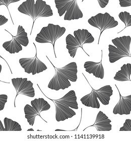 Seamless monochrome floral pattern with leaves of gingo biloba. Vector  silhouettes on white background .