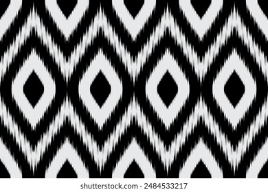 a seamless monochrome geometric ikat pattern in black and white. The detailed tribal design features repeating diamond shapes, making it perfect for use in textiles, backgrounds, and decorative