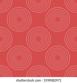 A seamless monochrome geometric pattern. Vector red abstract background. Abstract ornamen from circles.