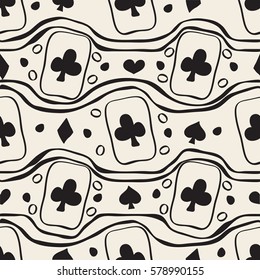 seamless monochrome hand drawn playing cards with spades ,diamonds, hearts and clubs pattern background