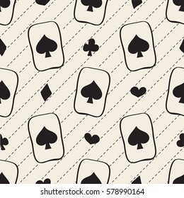 seamless monochrome hand drawn playing cards with spades ,diamonds, hearts and clubs pattern background