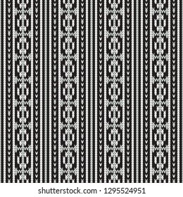 Seamless monochrome knitted pattern with vertical geometric stripes