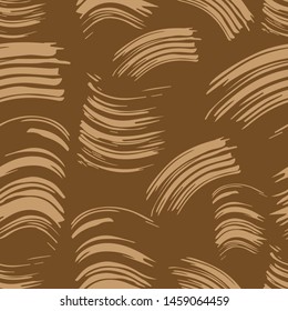 Seamless monochrome pattern. Abstract background. Imprint, blot, smear, mascara brush stain. Decorative print beige prints on a brown background