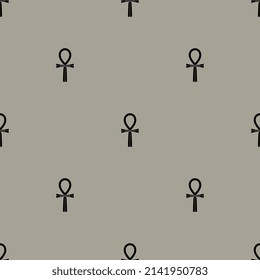 Seamless monochrome pattern with ancient Egyptian ankh cross symbols. Key of life. Black silhouettes on gray background.