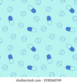 Seamless monochrome pattern in blue colors depicting pills in a flat design.