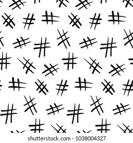 Seamless monochrome pattern with chaotic black doodle hashtag symbols on white background. Modern social media sign texture for textile, wrapping paper, cover, surface