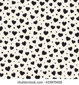 Seamless monochrome pattern with hearts and dots. Vector repeating texture.