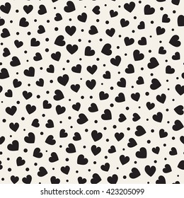 Seamless monochrome pattern with hearts and dots. Vector repeating texture.