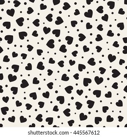 Seamless monochrome pattern with hearts and dots. Vector repeating texture.