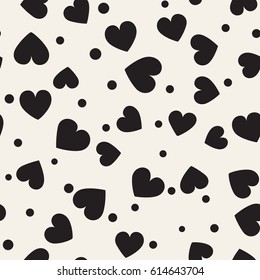 Seamless monochrome pattern with hearts and dots. Vector repeating texture.