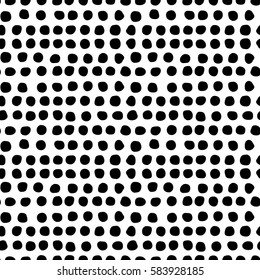 Seamless monochrome pattern in Memphis style. Black round dots Doodle. Fashion of 80s-90s. Textile seamless texture for wrapping paper