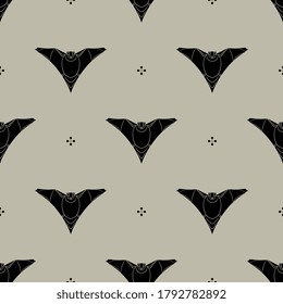Seamless monochrome pattern with stylized bats.