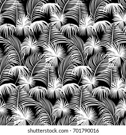 Seamless monochrome tropical pattern of palm trees. Black and white background for a Hawaiian shirt.