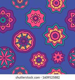 Seamless multicolor pattern with oriental mandalas. Hippie mandala star pattern. Kaleidoscope elements. Fabric, wallpaper or wrap print