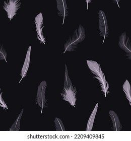 Seamless mystical pattern with feathers on a dark background