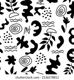 Seamless natural monochrome pattern. Black and white print of branches with leaves and different abstract shapes and lines. Vector texture.