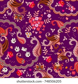 Seamless natural pattern in ethnic style. Magic birds, paisley and flowers isolated on dark lilac background.