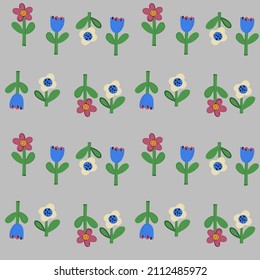 Seamless natural pattern of flowers in a simple shape. Vector print for paper, wallpaper and textile design.