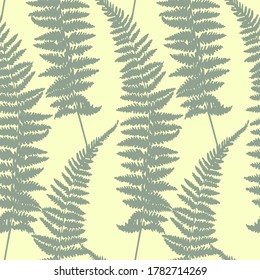 Seamless natural pattern or wallpaper. Silhouettes of various beautiful flowers, branches and leaves on a gentle background. Samples for wrapping paper and gifts. Stylized plants.