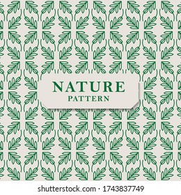 Seamless nature pattern with green leaves. Seamless vector texture. Leaves pattern perfect for wrapping paper and packaging design.