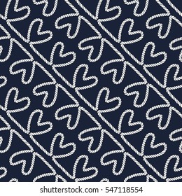 Seamless nautical romantic rope pattern. Endless ornament with white hearts on dark blue backdrop. Valentines day or wedding maritime style background. For fabric, wrapping, packaging paper