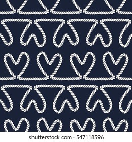 Seamless nautical romantic rope pattern. Endless ornament with white hearts on dark blue backdrop. Valentines day or wedding maritime style background. For fabric, wrapping, packaging paper