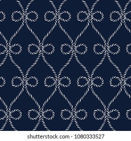 Seamless nautical rope pattern. Endless navy illustration with white loop ornament. Decorative wavy lines on dark blue backdrop. Trendy maritime style background. For fabric, wallpaper, wrapping