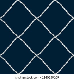 Seamless nautical rope pattern. Endless navy illustration with light cords ornament. Marine fishing net on dark blue backdrop. Trendy maritime style background. For fabric, wallpaper, wrapping