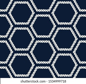 Seamless nautical rope pattern. Endless navy illustration with light cords ornament. Marine hexagon on dark blue backdrop. Trendy maritime style background. For fabric, wallpaper, wrapping