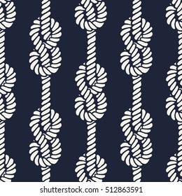 Seamless nautical rope pattern. Endless navy illustration with white loop ornament. Marine figure eight knots on dark blue backdrop. Trendy maritime style background. For fabric, wallpaper, wrapping