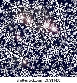 Seamless navy blue background with snowflakes. Pattern snowfall with sparkling flares. Vector illustration
