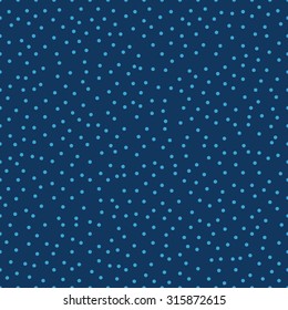 Seamless navy blue chaotic tileable polka dot pattern vector