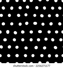 Seamless neutral polka dots pattern. White hand-drawn circles isolated on black background. Abstract lines of points ornament. Vector illustration for wallpaper, fabric, print, wrapping paper, textile