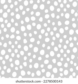 Seamless neutral polka dots pattern. White hand-drawn circles isolated on Grey background. Abstract Random points ornament. Vector illustration for wallpaper, fabric, print, wrapping paper, textile