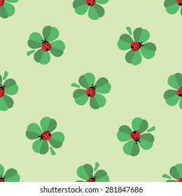 Seamless nice green  pattern with happy clover and ladybird, vector 