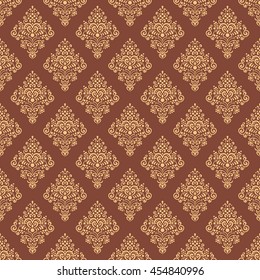 Seamless old style pattern. Vintage background. Classic style texture. For wallpaper, textile, fabric, scrap paper, background, etc. Yellow on brown background.