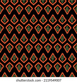 Seamless orange ethnic ikat boho textile pattern fabric background, illustration decorative fashion art patchwork. 