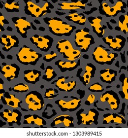 Seamless orange leopard print. Vector pattern, texture, background