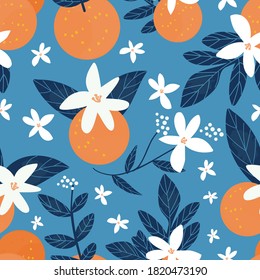 Seamless oranges background with flowers. Floral oranges pattern on blue background.