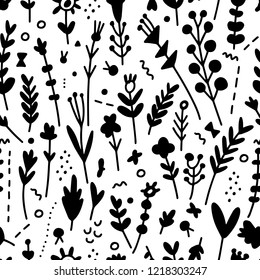 The seamless organic pattern with abstract flowers elements. Hand drawn doodle ethnic nature background for your design.Textile, blog decoration, banner, poster, wrapping paper.