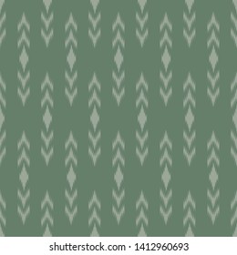 seamless oriental ikat ethic and tribal pattern on green