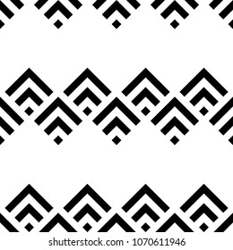 Seamless oriental mountains pattern. Repeated chevrons, diamonds, angle brackets background. Squama ornament. Scales image. Ancient window tracery motif. Digital paper, textile print. Vector artwork.