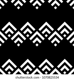 Seamless oriental mountains pattern. Repeated chevrons, diamonds, angle brackets background. Squama ornament. Scales image. Ancient window tracery motif. Digital paper, textile print. Vector artwork.