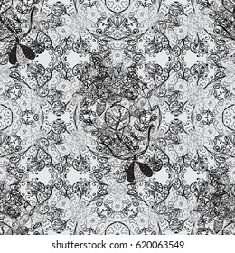 Seamless oriental ornament in the style of baroque. Traditional classic white vector pattern on gray background with white elements.