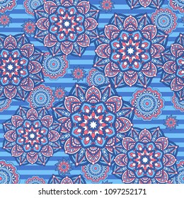 Seamless oriental ornamental pattern. Vector laced decorative background with floral and geometric ornament. Repeating striped tiles with mandala. Indian or Arabic motive.